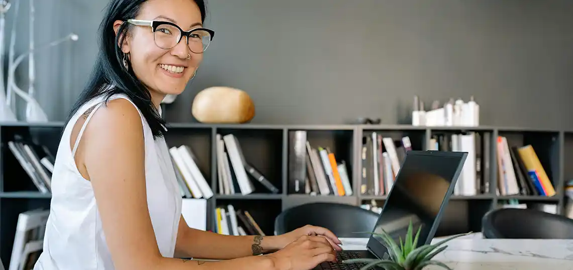 Asian woman on laptop