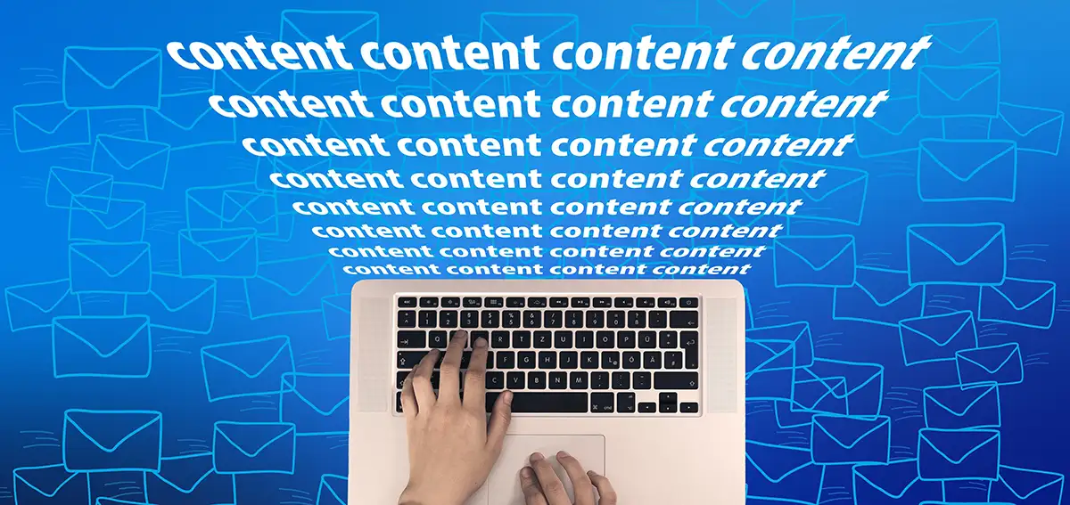 Laptop with hands and the words content repeated