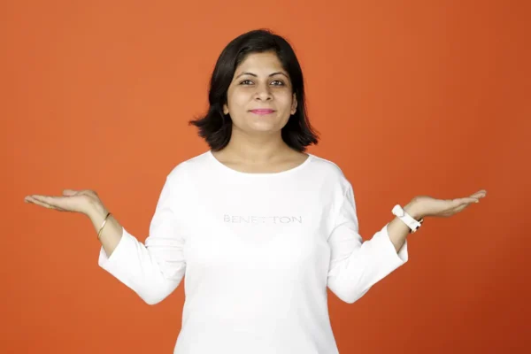 Woman with arms out looking for answers