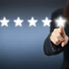 Business Person Pointing to 5-stars