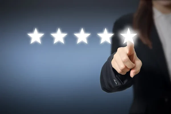 Business Person Pointing to 5-stars