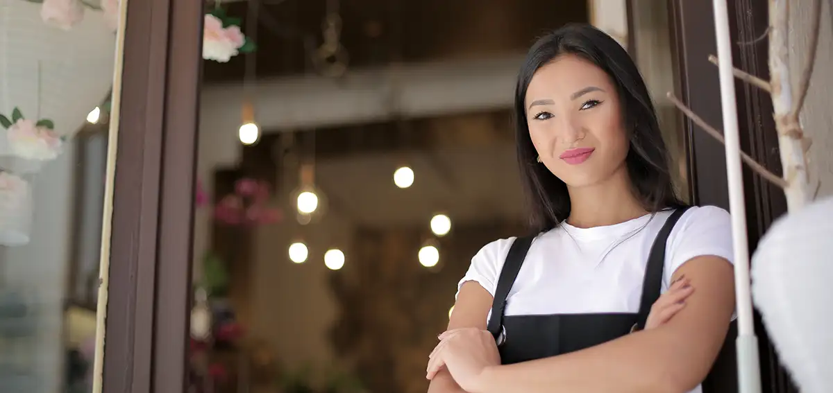 Female Asian shop owner