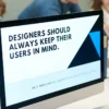 Web Designer Looking at large monitor