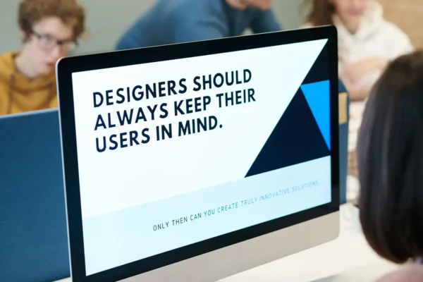 Web Designer Looking at large monitor